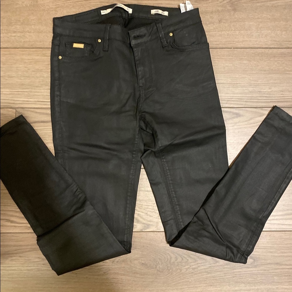Brand new Zara black coated skinny jeans in size 2